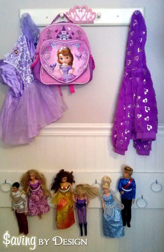 Need somewhere to store all of those Barbie or princess dolls? You'll love this cheap and easy DIY Barbie doll organizer!