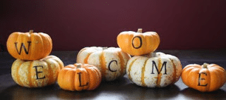 fall fireplace decor - stamped mini pumpkins