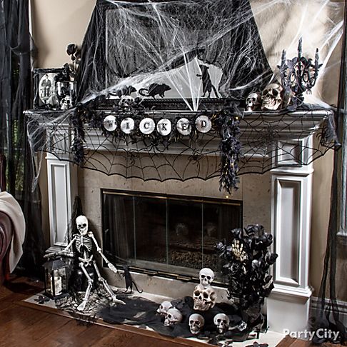 These Halloween fireplace mantels will inspire you to create a perfectly decorated seasonal fireplace in your home...I'm sure it's going to be SPOOKtacular!