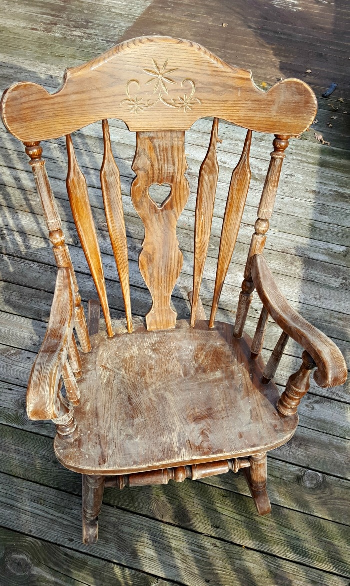 Our nursery rocking chair was in need of a makeover for our third child...so I figured out how to spray paint a wooden rocking chair for less than $10!