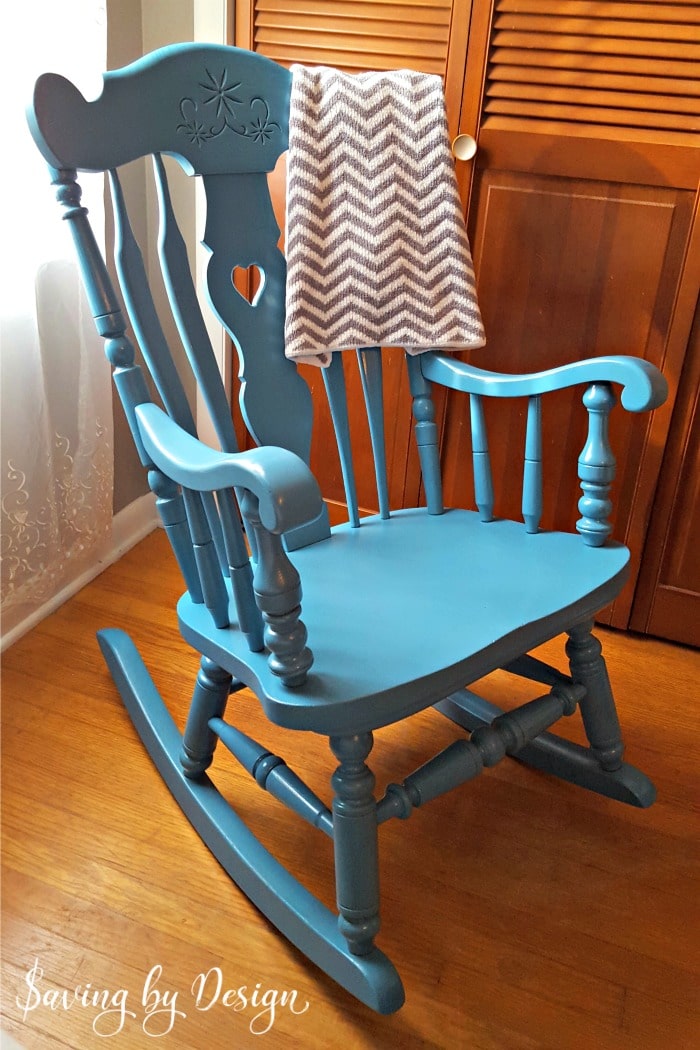 Our nursery rocking chair was in need of a makeover for our third child...so I figured out how to spray paint a wooden rocking chair for less than $10!