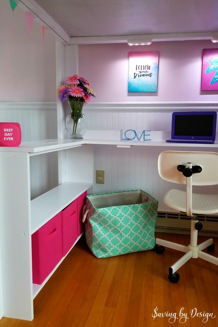 bunk bed with a desk on the bottom